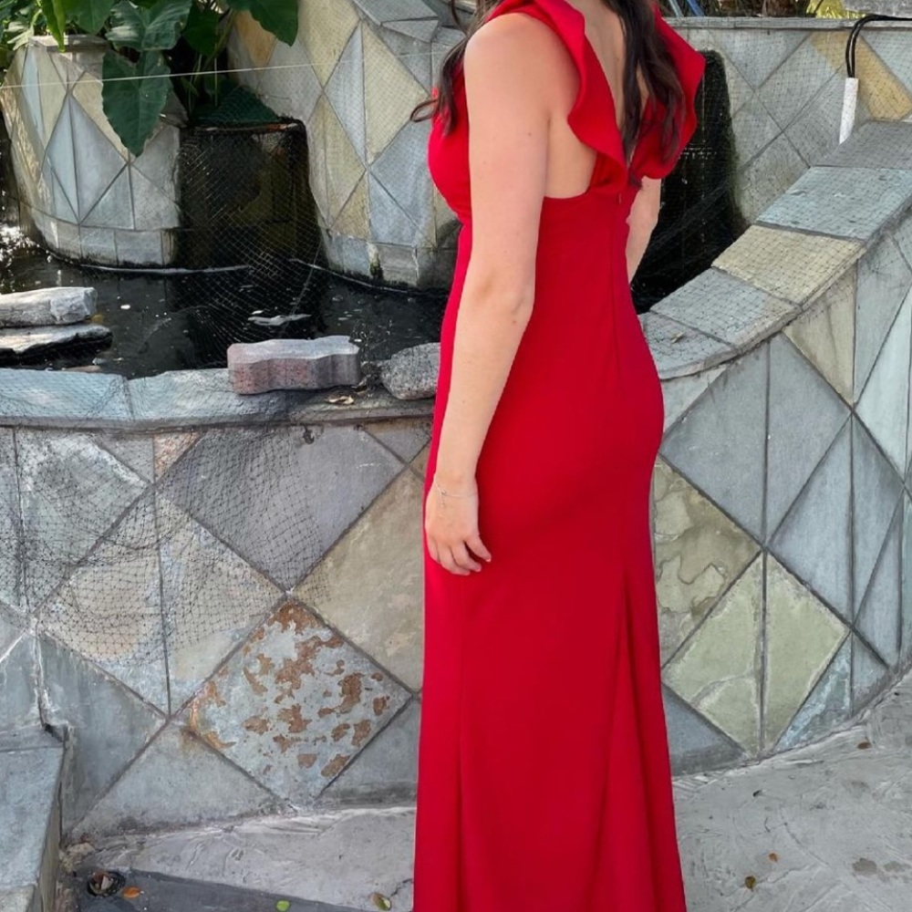 Red gown with ruffles as straps